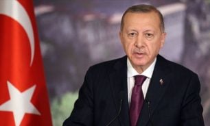 أردوغان: نعرف كيف نكسر الأيادي القذرة التي تطال علم تركيا image